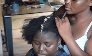 Hiding rice in African hair Maroon tradition.