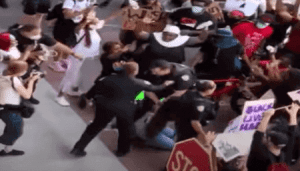 Steven Pohorence attacks kneeling protester in Fort Lauderdale.